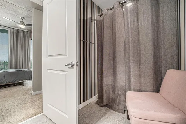 a living room with furniture and a gate