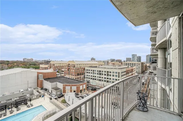 a view of a balcony with city view