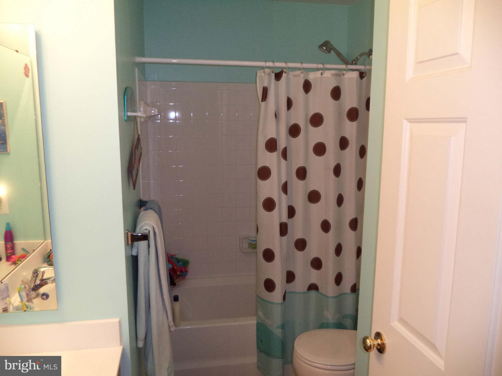 1335 Steed Street Ranson, WV 25438 - Photo 14 of 17 a bathroom with a toilet and a shower
