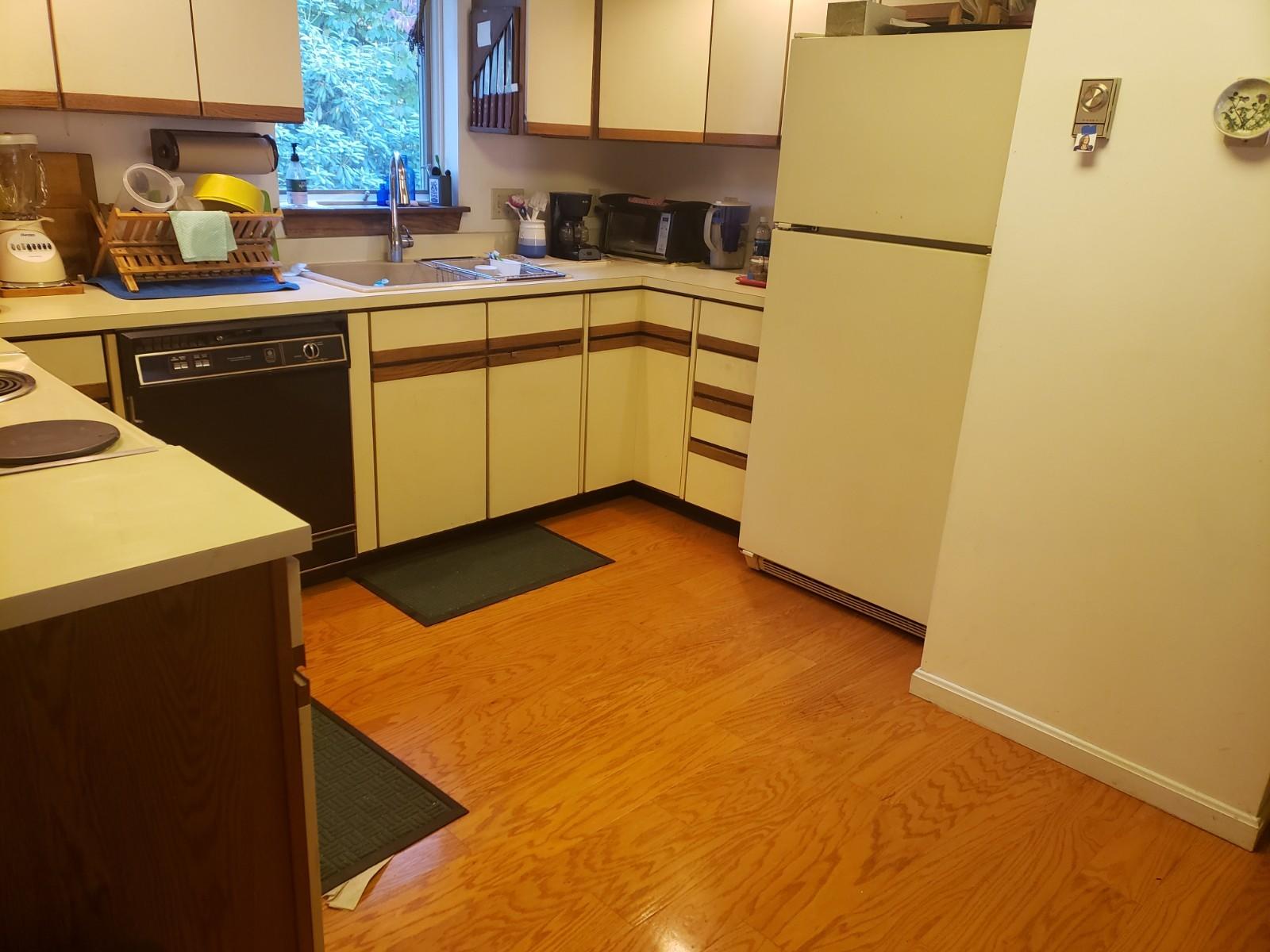 19 Birch Meadow Road, Unit 19 Brunswick, ME 04011 - Photo 11 of 16 Kitchen with Pergo floor 20201022_140314