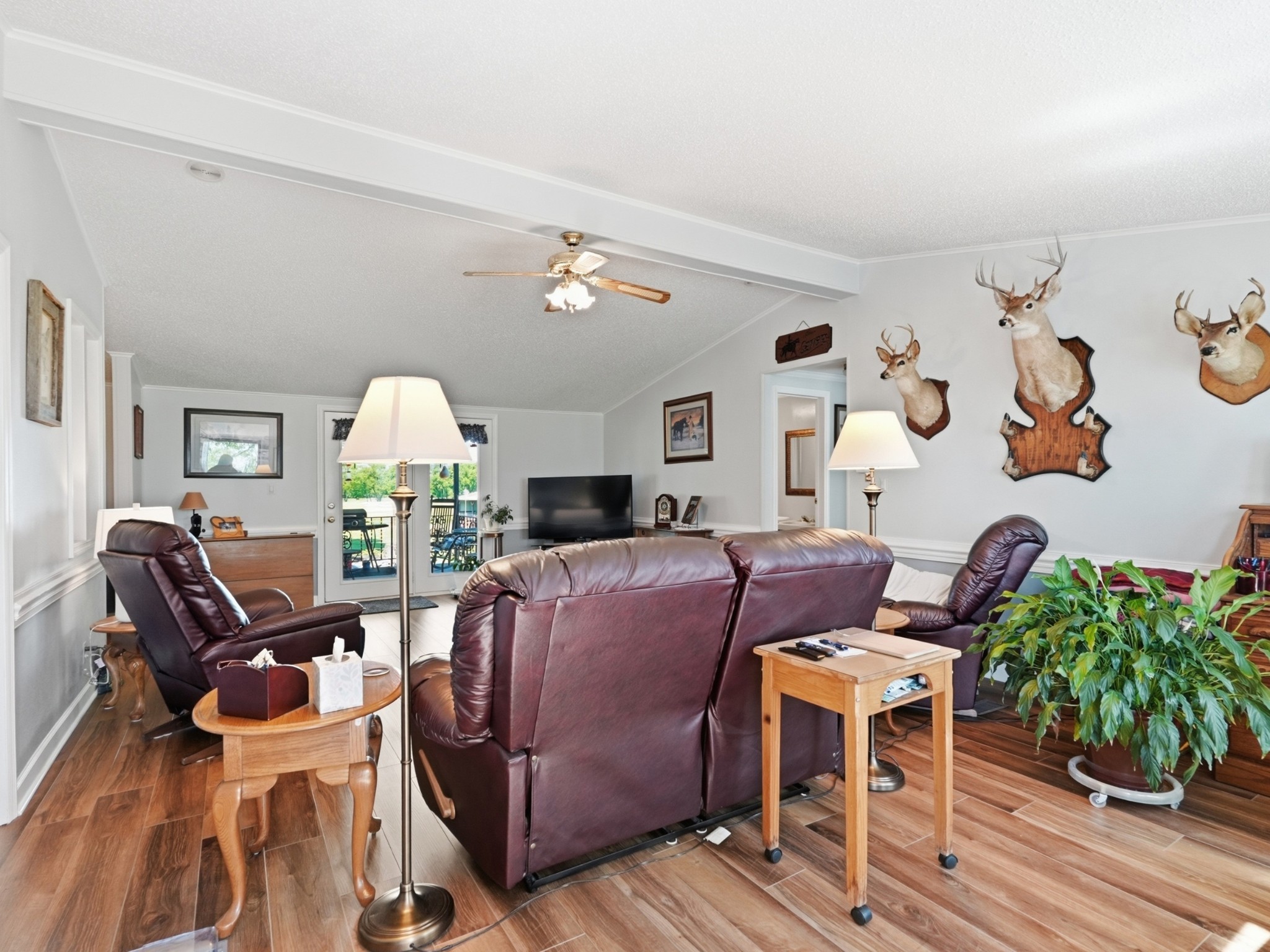 597 Hiwassee Road Lebanon, TN 37087 - Photo 11 of 37 a living room with furniture fireplace and wooden floor