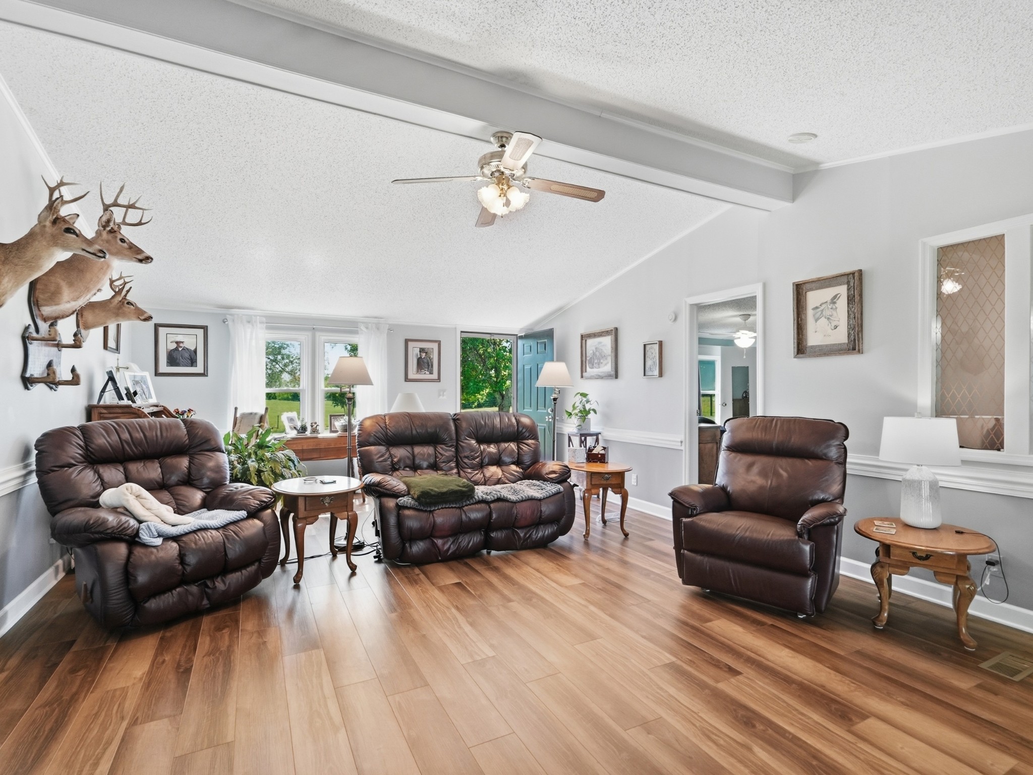 597 Hiwassee Road Lebanon, TN 37087 - Photo 14 of 37 a living room with furniture ceiling fan and a rug