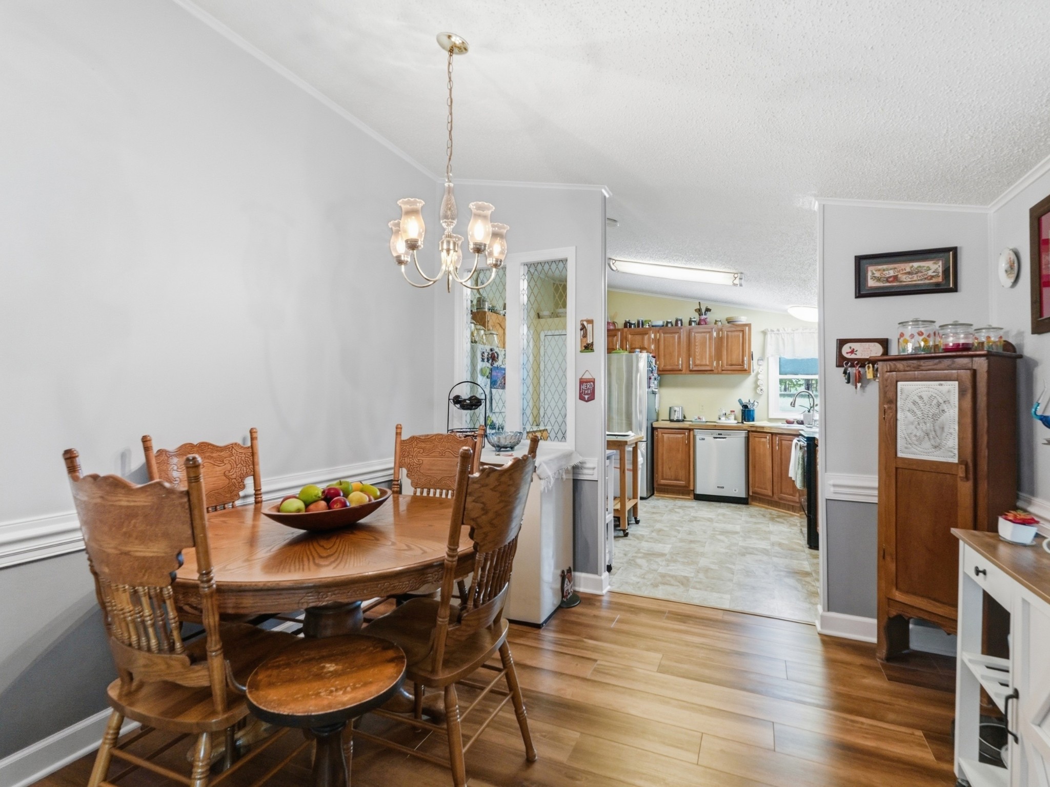 597 Hiwassee Road Lebanon, TN 37087 - Photo 15 of 37 a view of a dining room with furniture and wooden floor