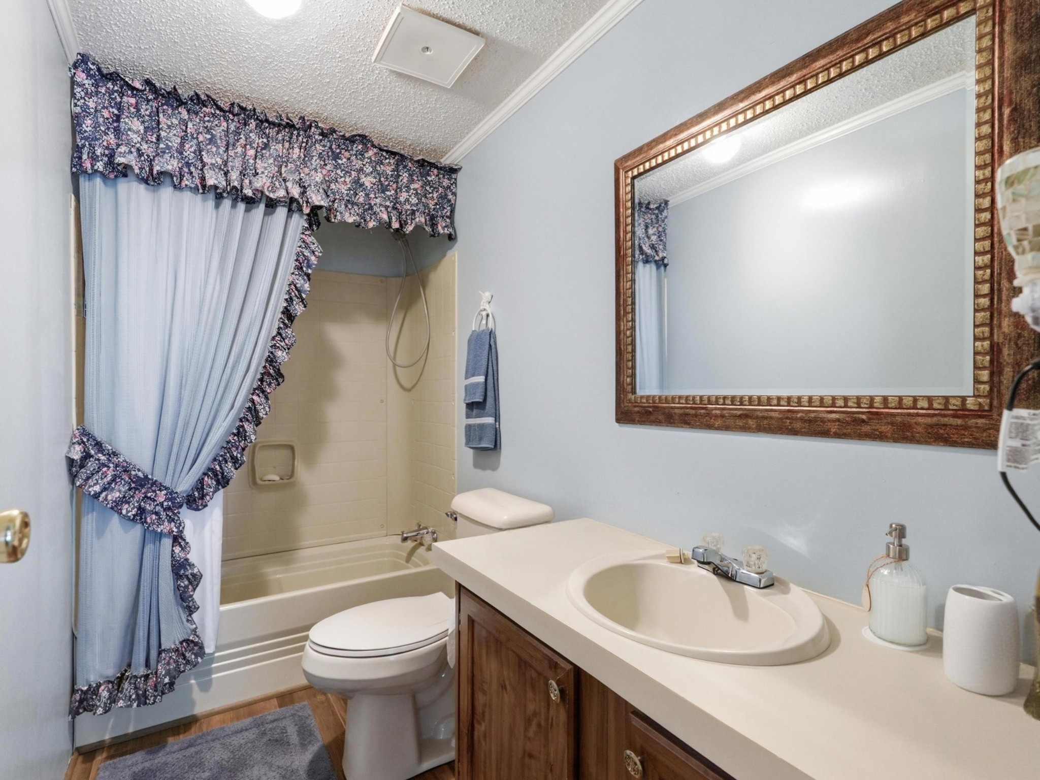 597 Hiwassee Road Lebanon, TN 37087 - Photo 20 of 37 a bathroom with a sink a toilet and shower