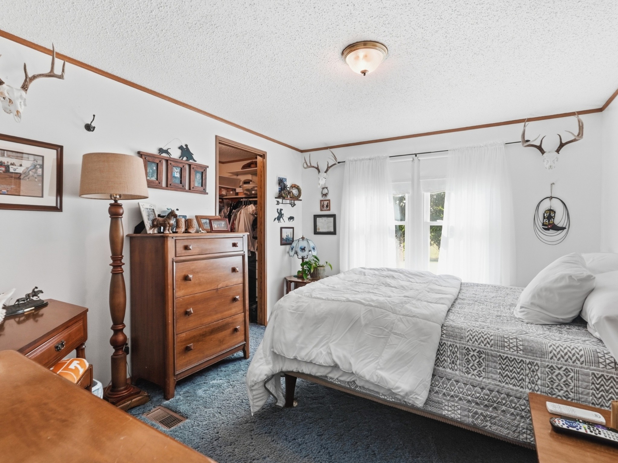 597 Hiwassee Road Lebanon, TN 37087 - Photo 22 of 37 a bedroom with a bed and a cabinets