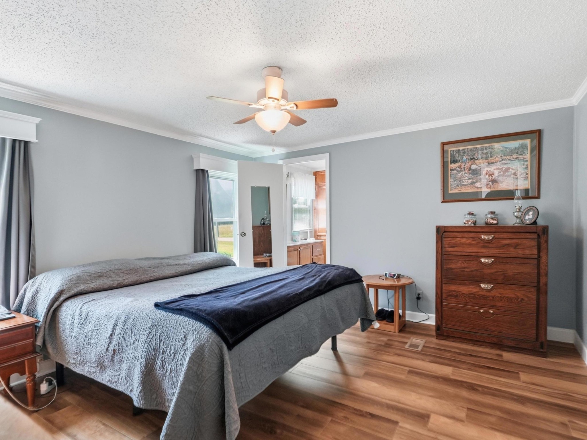 597 Hiwassee Road Lebanon, TN 37087 - Photo 23 of 37 a bedroom with a bed and a dresser