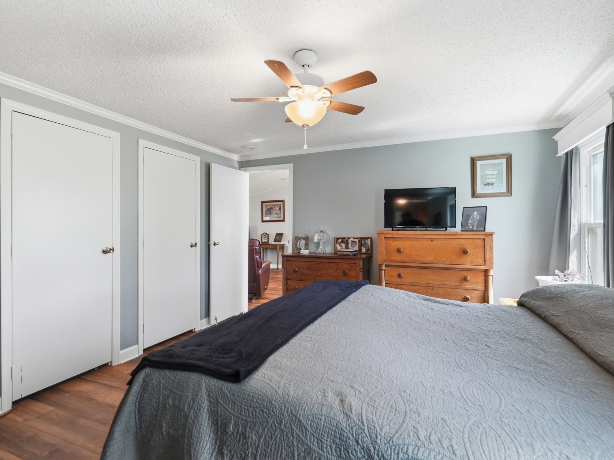 597 Hiwassee Road Lebanon, TN 37087 - Photo 24 of 37 a bedroom with a bed and a flat screen tv