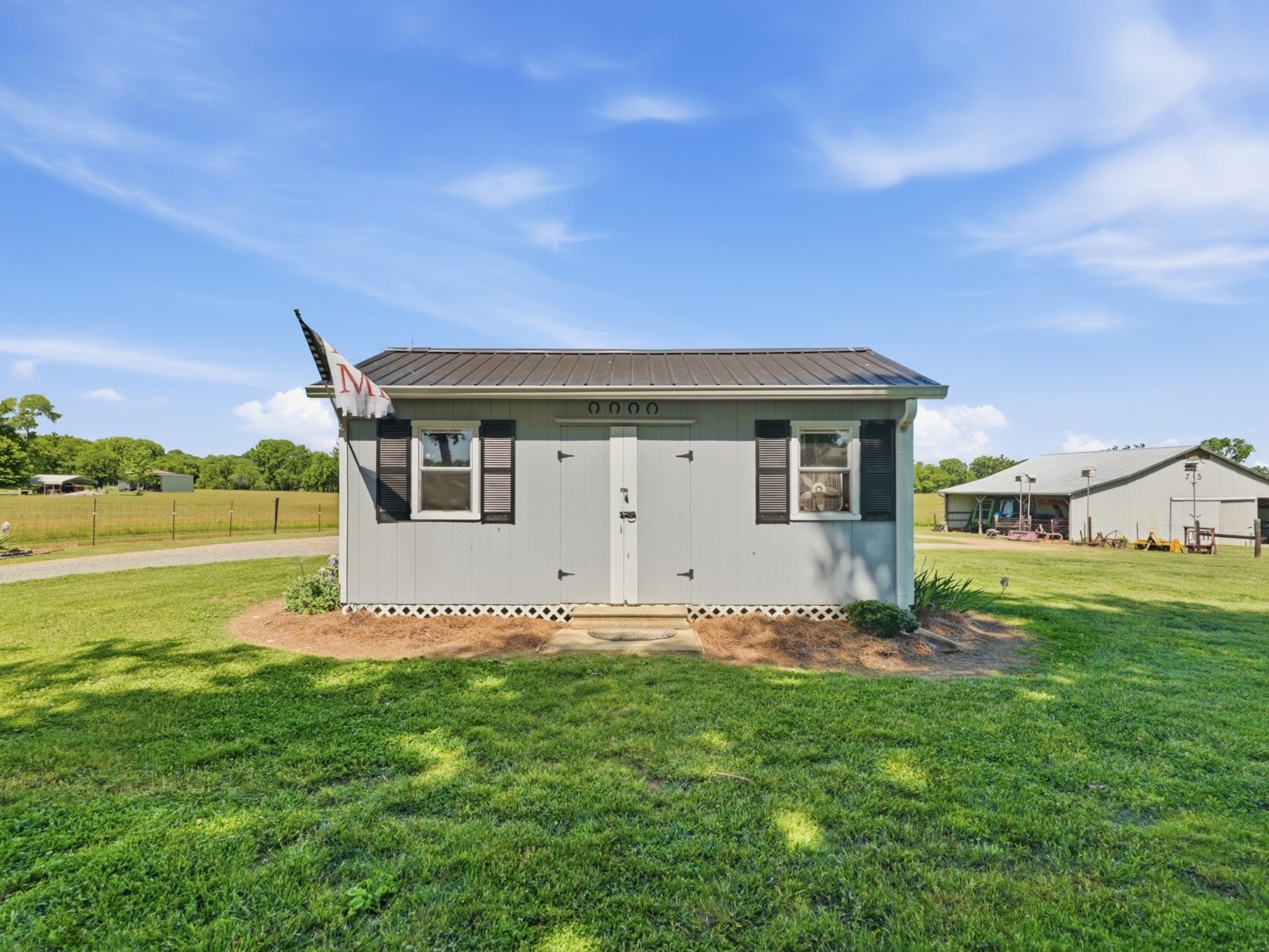 597 Hiwassee Road Lebanon, TN 37087 - Photo 33 of 37 a front view of a house with a garden