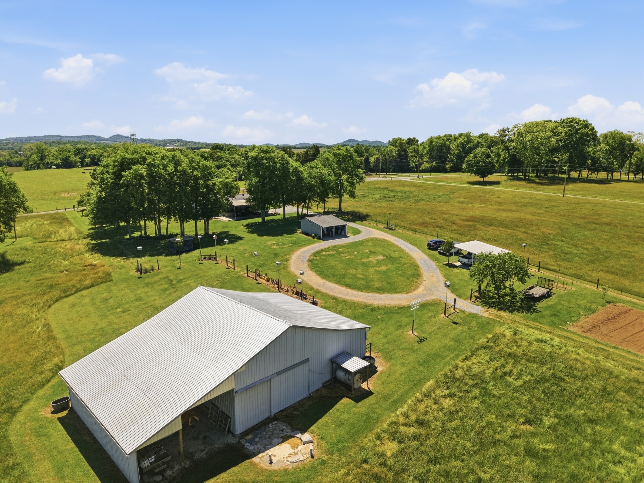 597 Hiwassee Road Lebanon, TN 37087 - Photo 34 of 37 a view of a swimming pool with an outdoor space and seating area