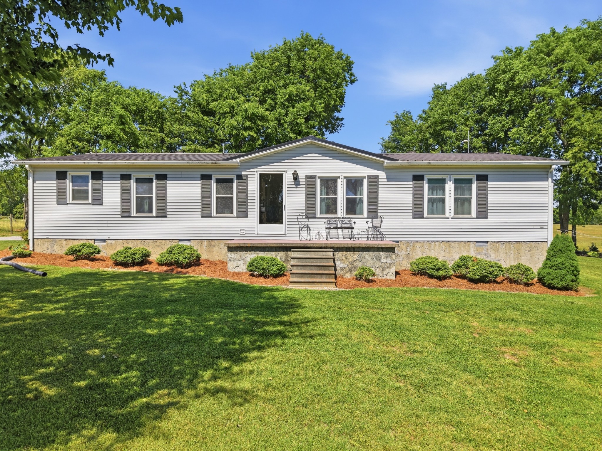 597 Hiwassee Road Lebanon, TN 37087 - Photo 8 of 37 a front view of house with yard and green space
