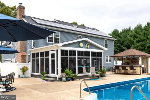 a view of livingroom with furniture and a window