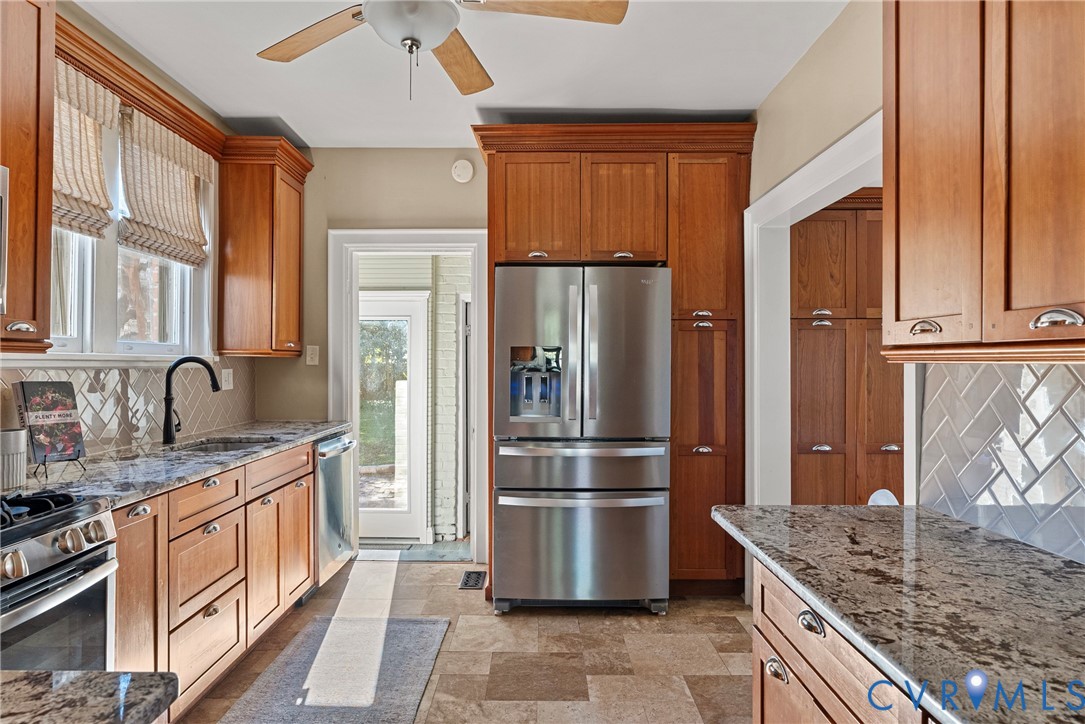 2517 Hilliard Road Henrico, VA 23228 - Photo 19 of 47 a kitchen with stainless steel appliances granite countertop a refrigerator and a sink