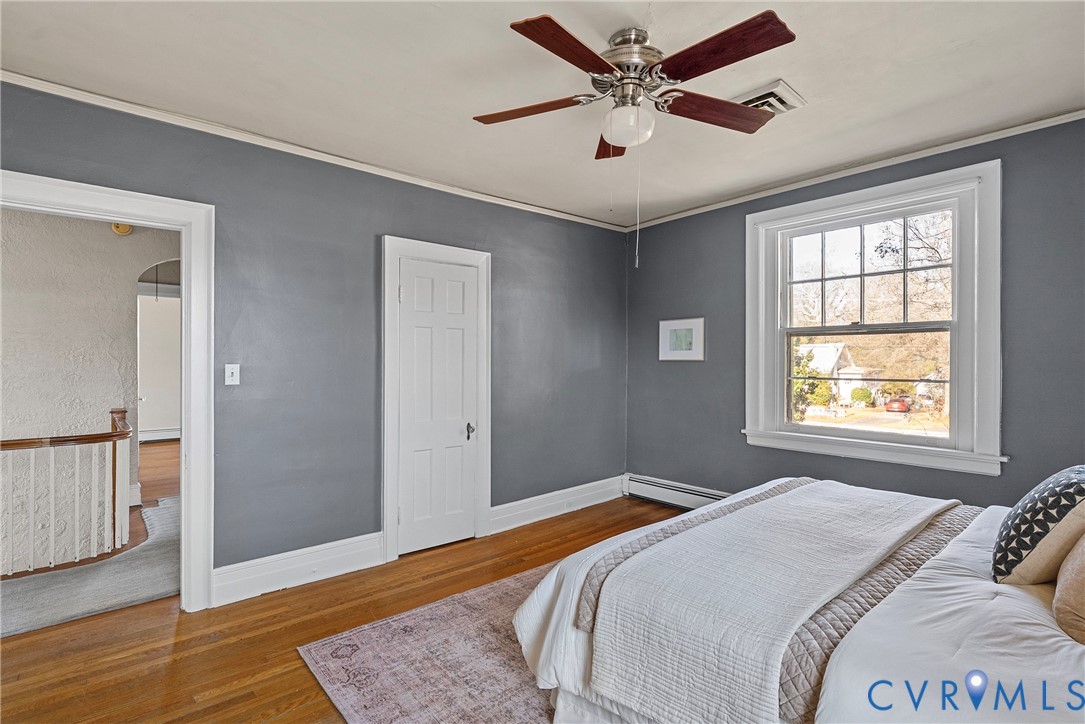 2517 Hilliard Road Henrico, VA 23228 - Photo 33 of 47 a bedroom with a large bed and a window