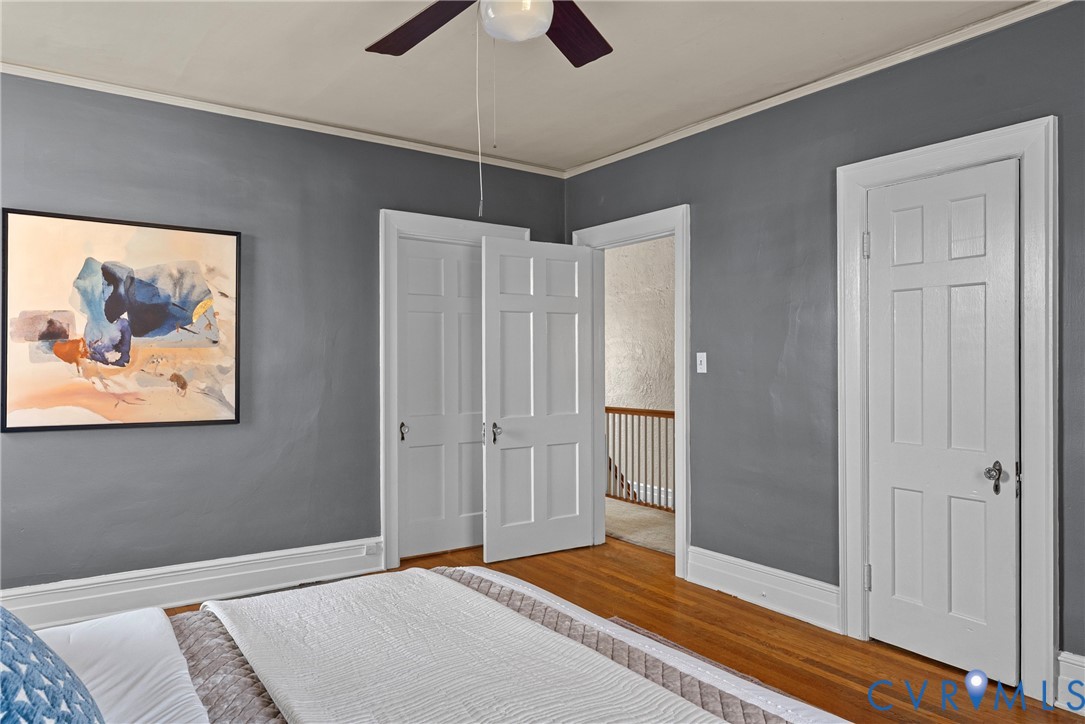 2517 Hilliard Road Henrico, VA 23228 - Photo 34 of 47 a bedroom with a bed and a painting on the wall