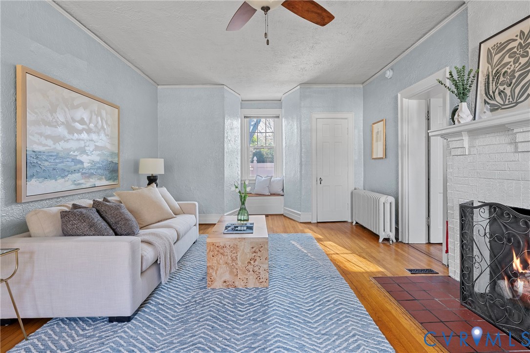 2517 Hilliard Road Henrico, VA 23228 - Photo 9 of 47 a living room with furniture and a fireplace