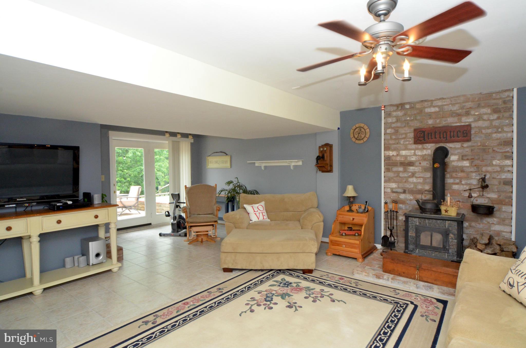911 Horizon Road Mount Airy, MD 21771 - Photo 16 of 25 Family Room w cozy wood stove