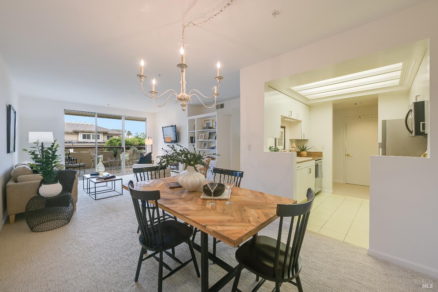 400 Deer Valley Road, Unit 2A San Rafael, CA 94903 - Photo 2 of 22 a view of a dining room with furniture and wooden floor