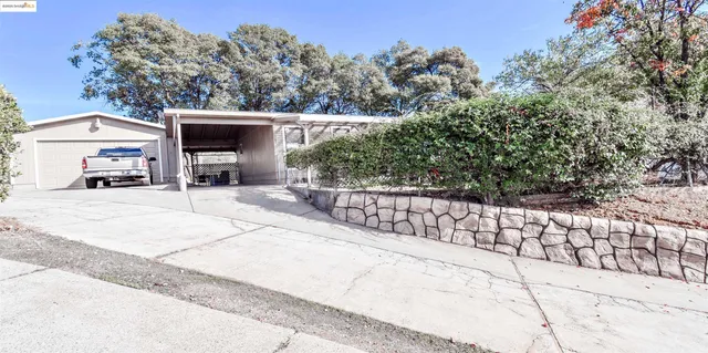 a view of house with outdoor space