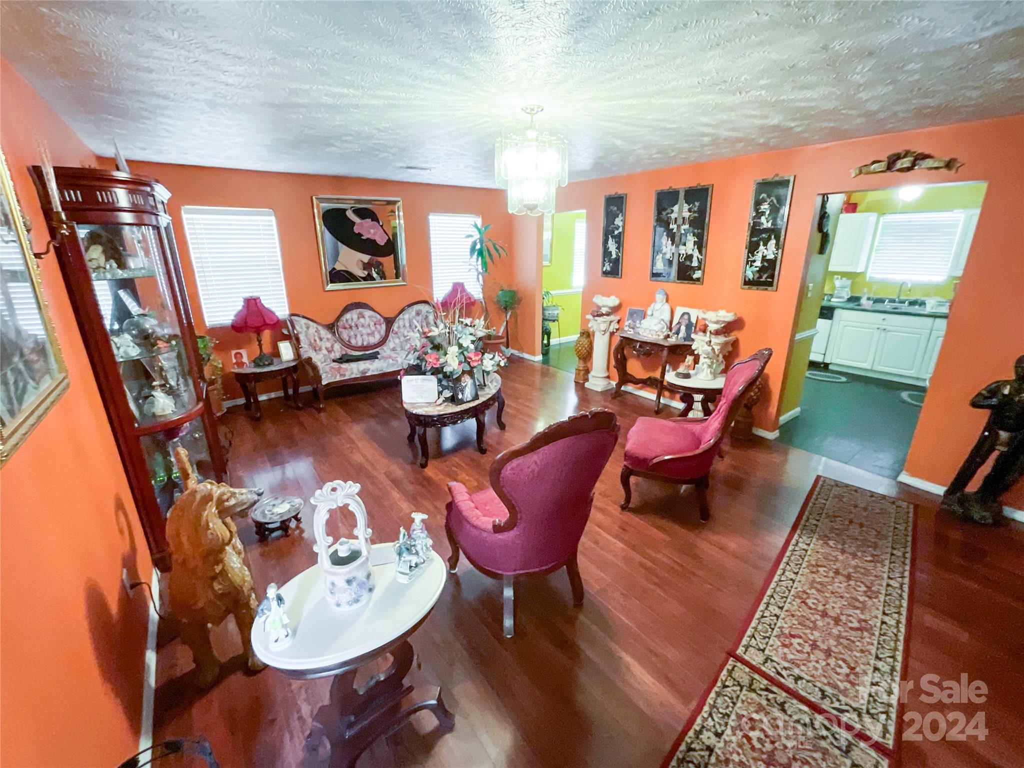 267 Homeplace Road Rockingham, NC 28379 - Photo 14 of 47 a dining room with furniture and wooden floor
