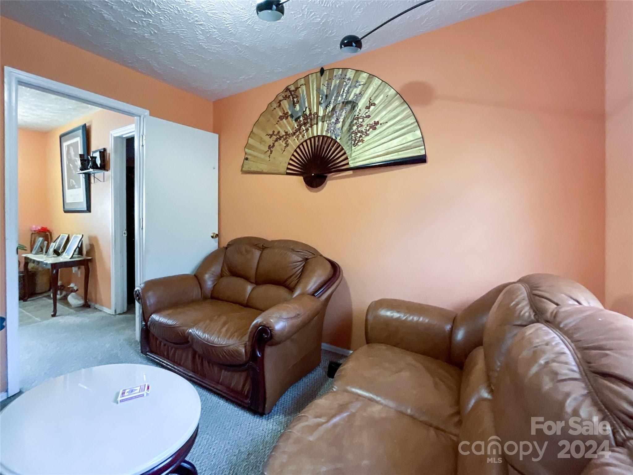 267 Homeplace Road Rockingham, NC 28379 - Photo 29 of 47 a living room with furniture and a window