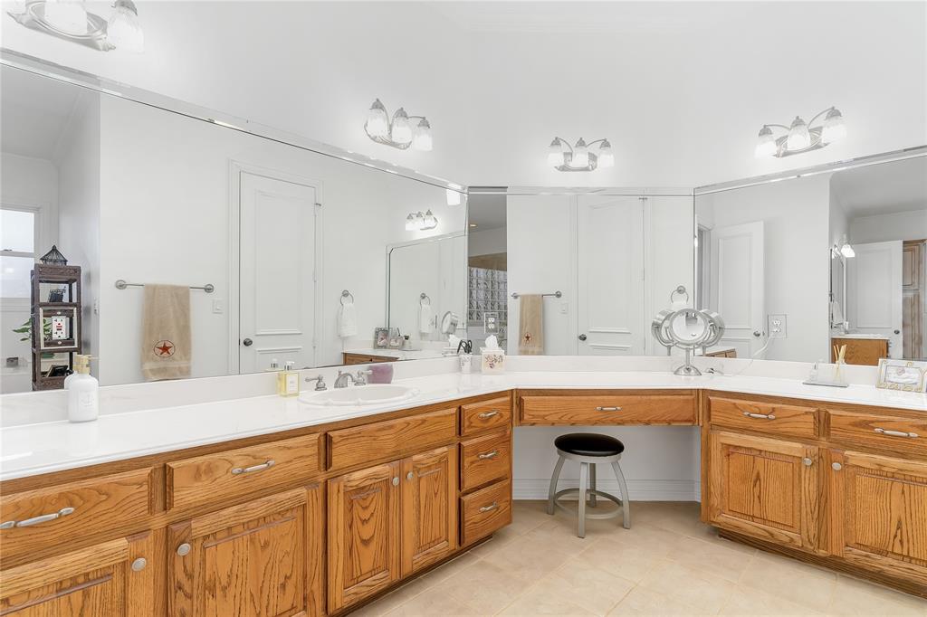 4520 South Nolan River Road Cleburne, TX 76033 - Photo 20 of 40 Bathroom with tile patterned floors and vanity