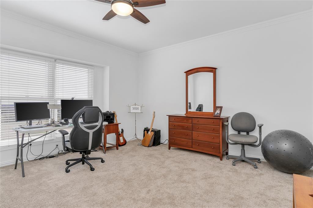 4520 South Nolan River Road Cleburne, TX 76033 - Photo 37 of 40 Carpeted home office featuring baseboards, a ceiling fan, and ornamental molding