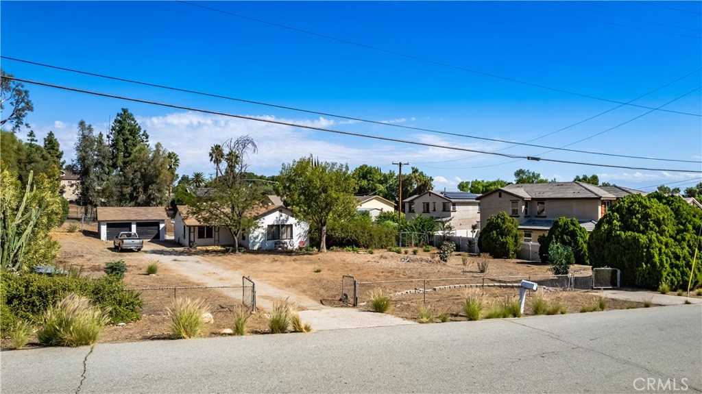 12043 Knoefler Drive Riverside, CA 92505 - Photo 13 of 15 a view of swimming pool with outdoor seating and plants