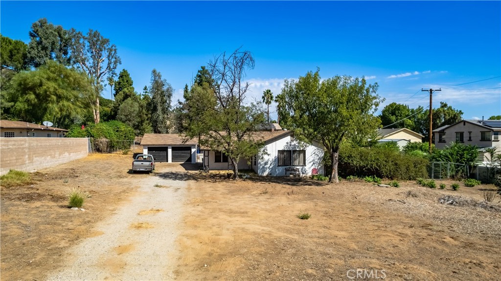 12043 Knoefler Drive Riverside, CA 92505 - Photo 14 of 15 a view of a house with a yard covered in snow