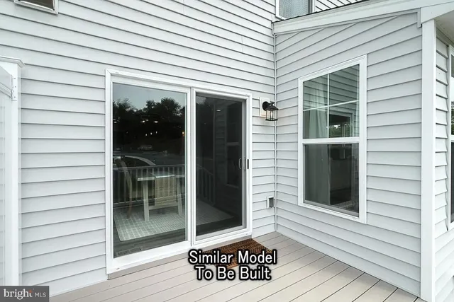 a view of a door and a window