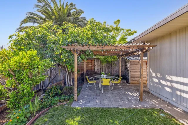 a view of chair and table in the patio