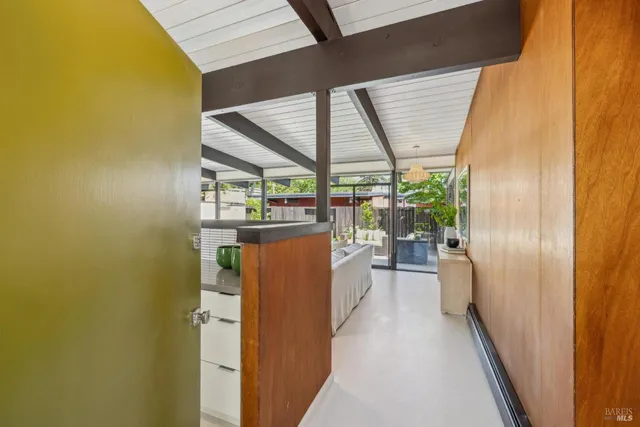 a view of a storage & utility room with a sink