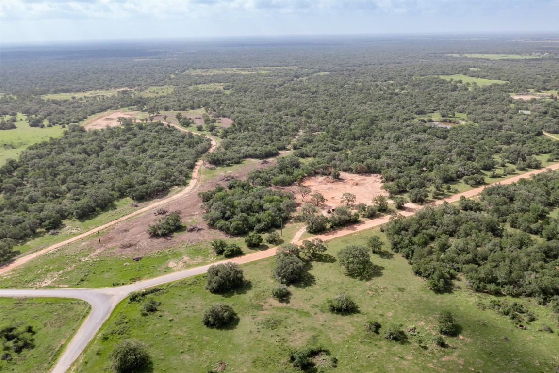 30-acres Cattle Guard Road Cuero, TX 77954 - Photo 1 of 50 an aerial view of residential building and lake