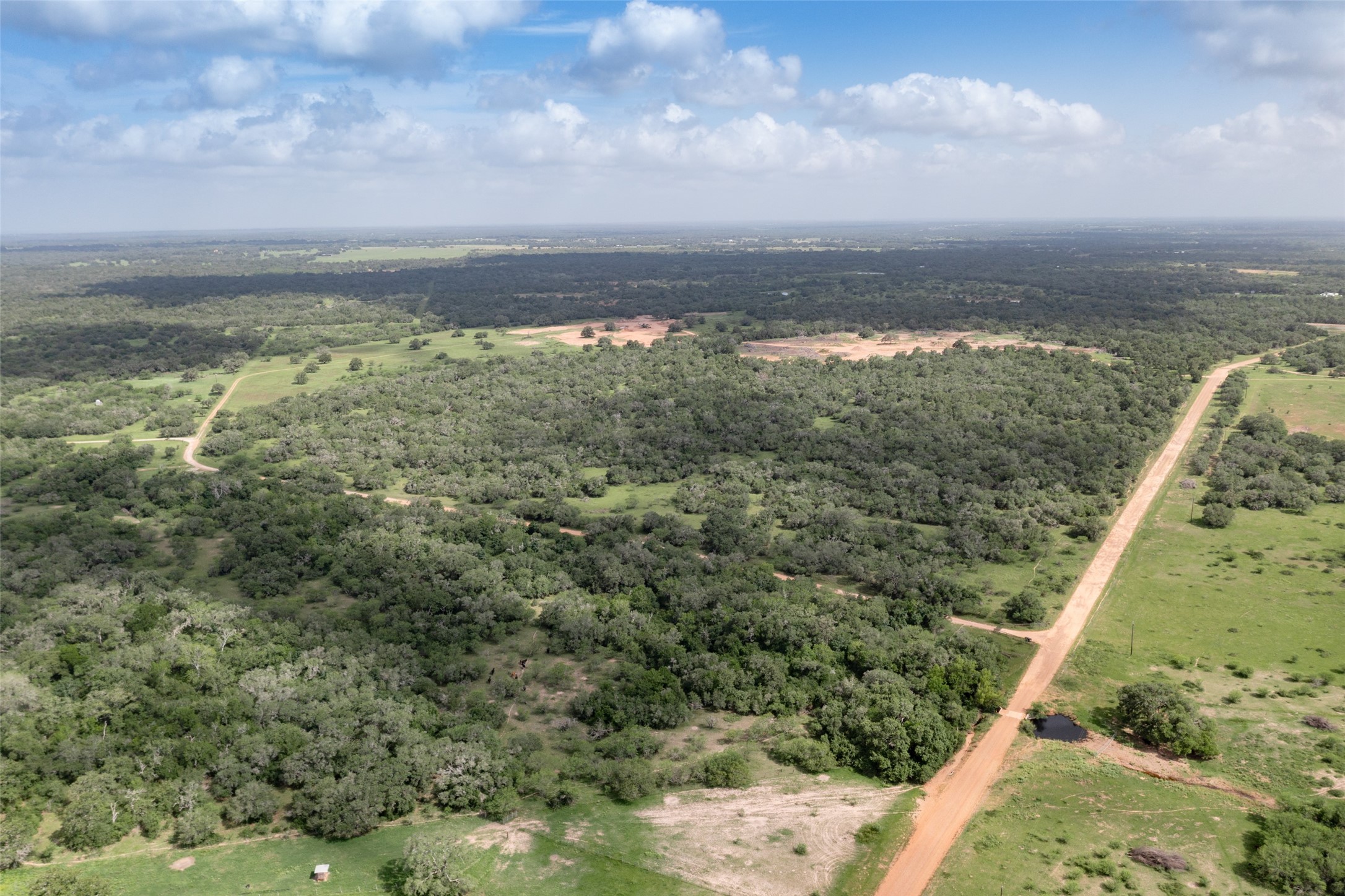 54.68-acres Cattle Guard Road Cuero, TX 77954 - Photo 17 of 50 a view of a city with an ocean