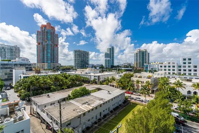 swimming pool view with a outdoor seating