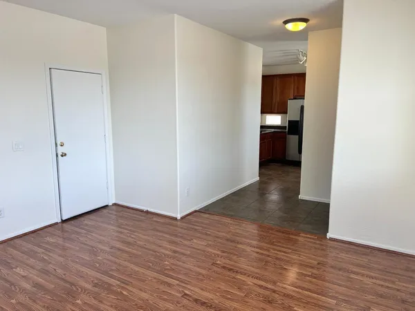 a view of a room with wooden floor backyard and bathroom
