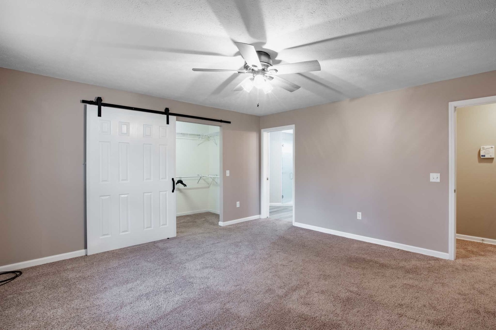 11052 Prestwick Drive Benton, IL 62812 - Photo 18 of 46 a view of an empty room and chandelier fan