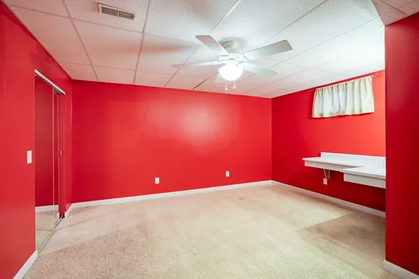 a view of a room with racks on the wall