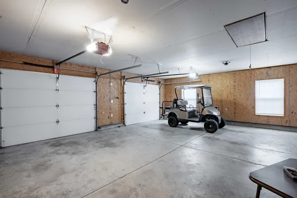 a view of hallway with seating area
