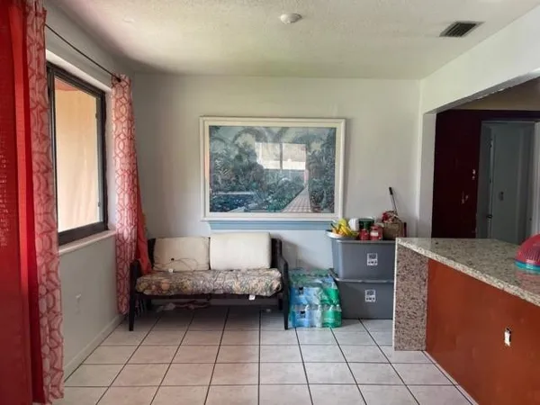 a room with furniture and window