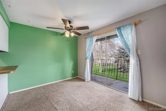 a view of a room with a large window