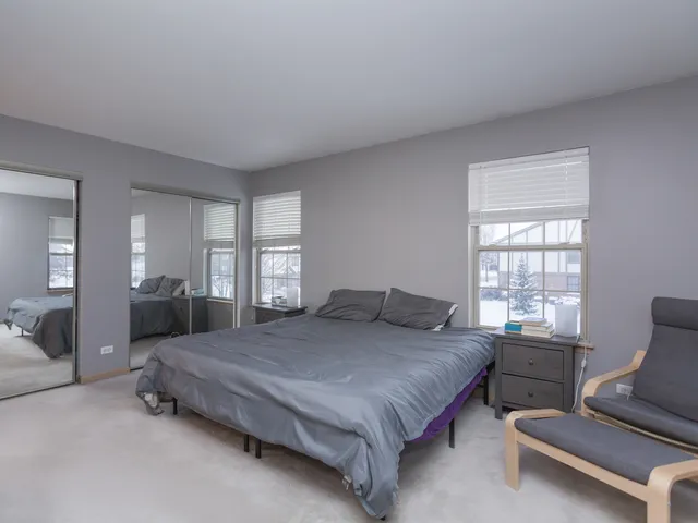 a bedroom with a bed and furniture