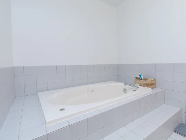 a bathroom with a bathtub