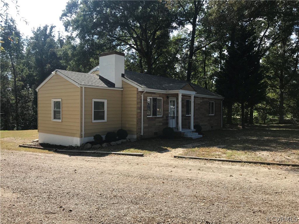 713 Enon Church Road Chester, VA 23836 - Photo 3 of 23 a front view of a house with a yard