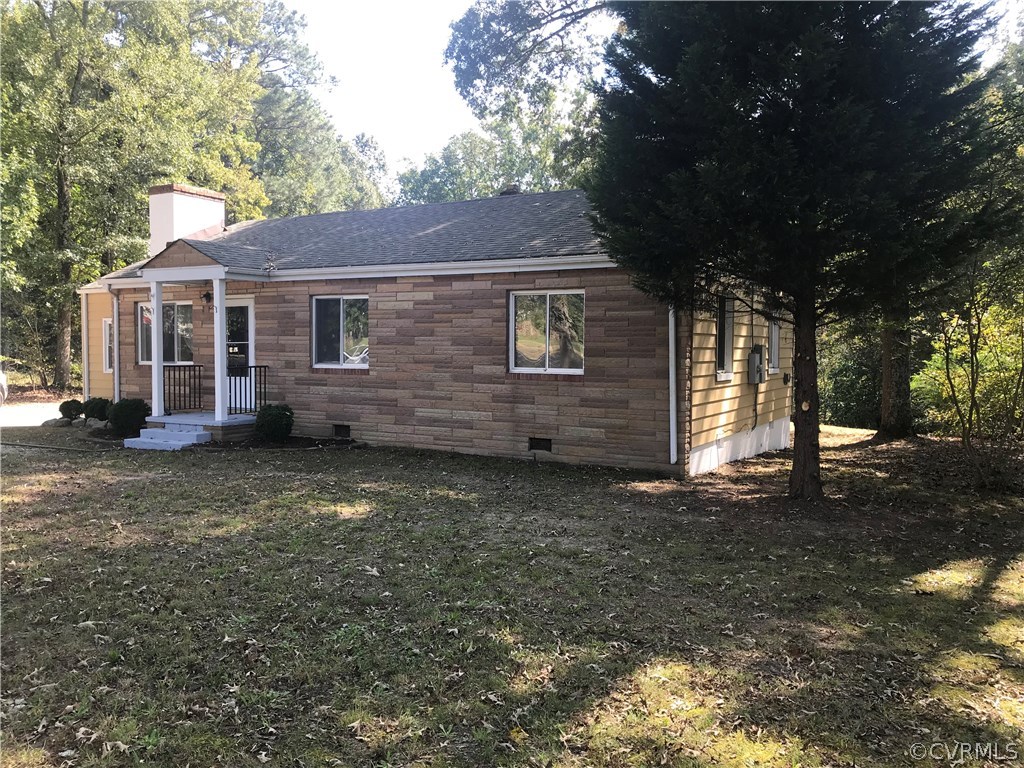 713 Enon Church Road Chester, VA 23836 - Photo 8 of 23 a view of a house with a yard