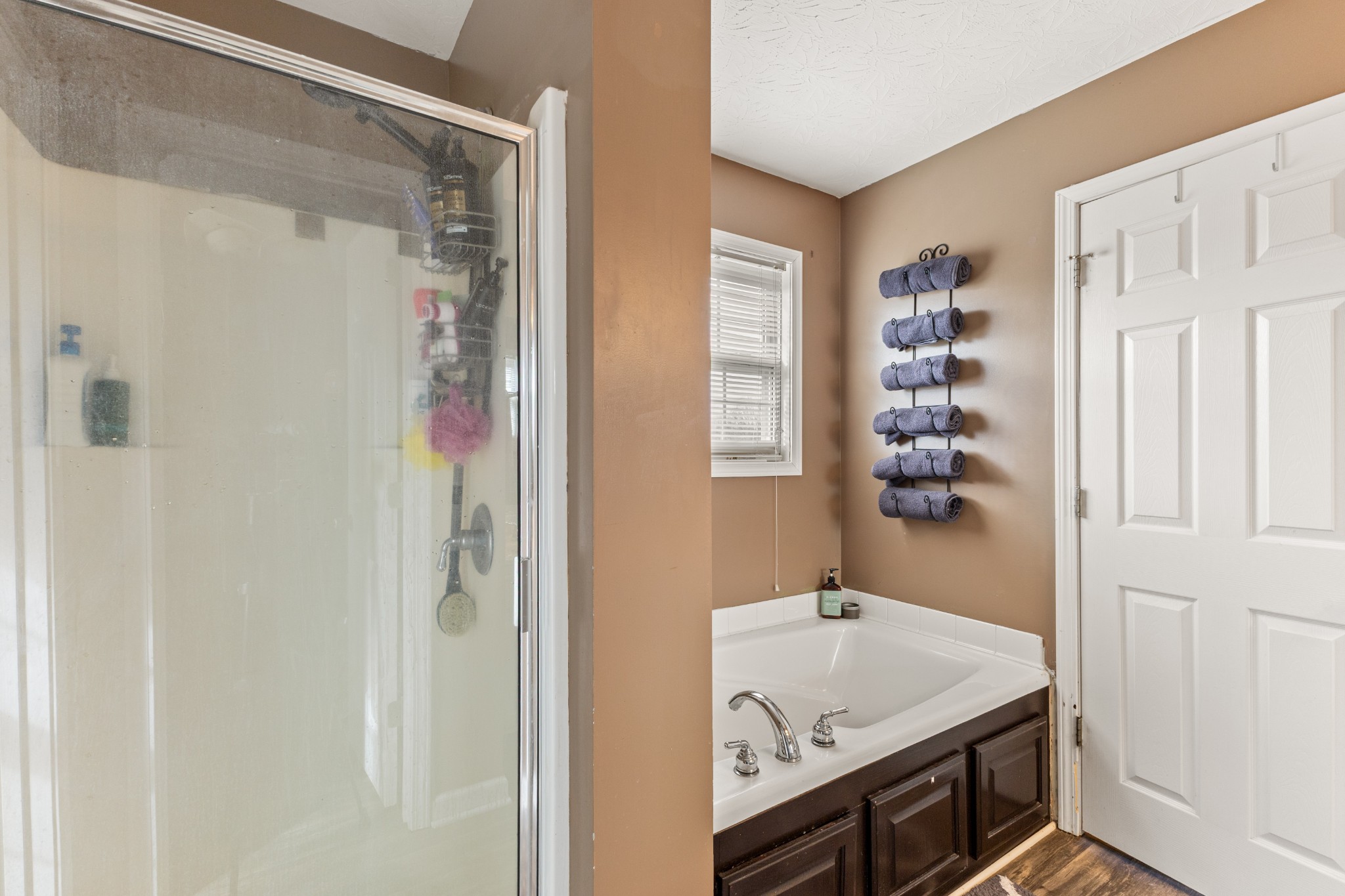 205 Emerald Circle Pleasant View, TN 37146 - Photo 12 of 22 a bathroom with a tub and a sink