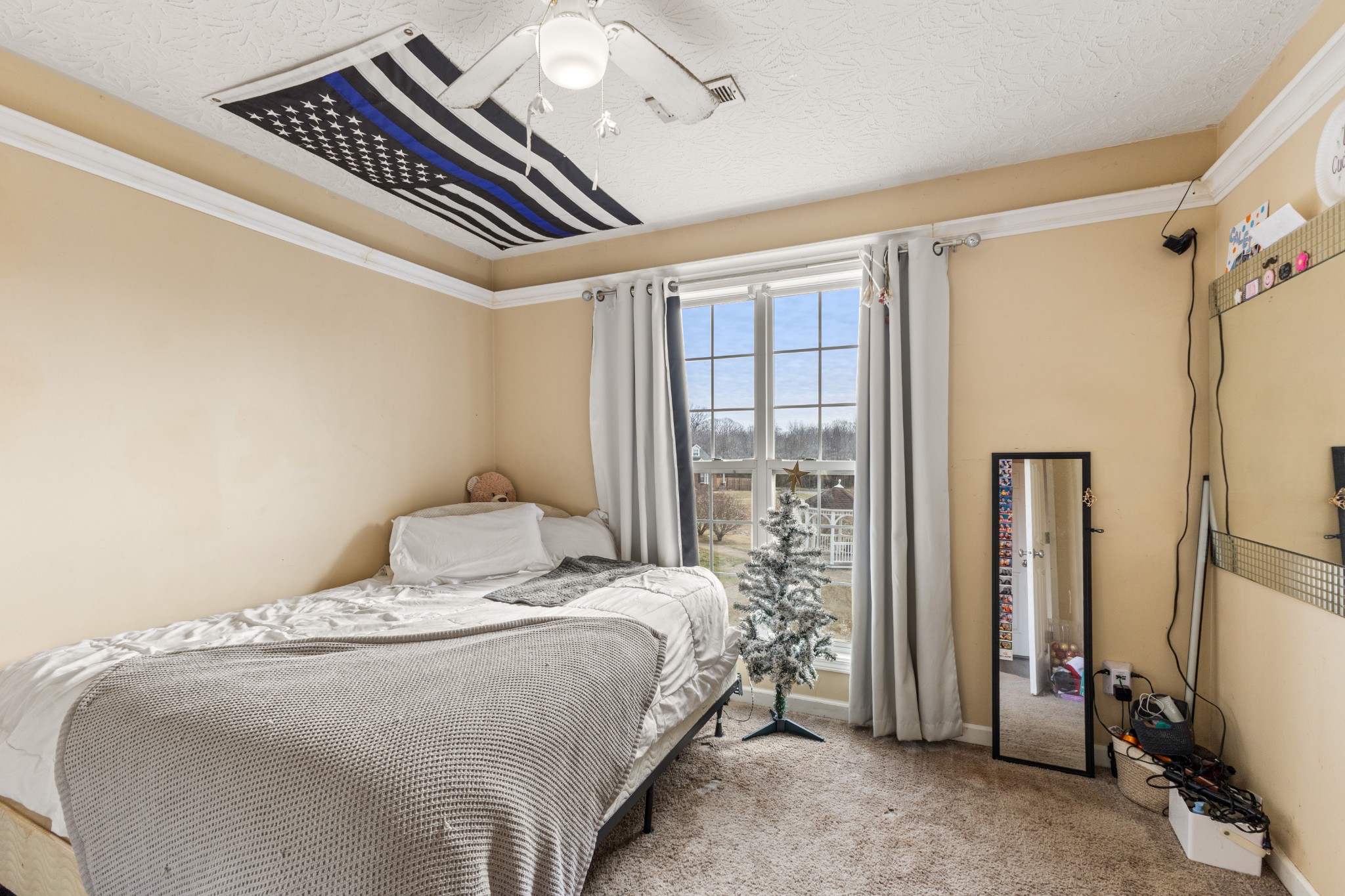 205 Emerald Circle Pleasant View, TN 37146 - Photo 13 of 22 a bedroom with a bed and a window