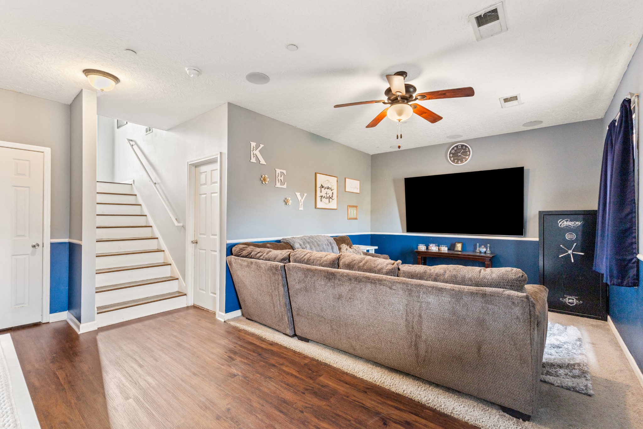 205 Emerald Circle Pleasant View, TN 37146 - Photo 18 of 22 a living room with furniture and a flat screen tv