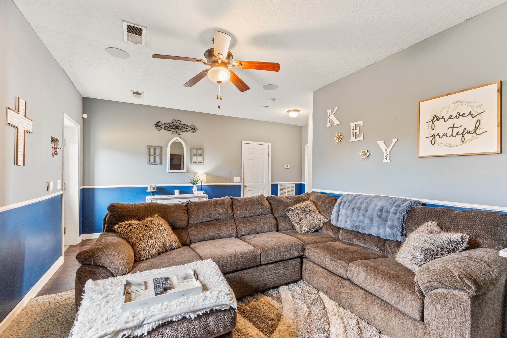 205 Emerald Circle Pleasant View, TN 37146 - Photo 19 of 22 a living room with furniture and painting on the wall
