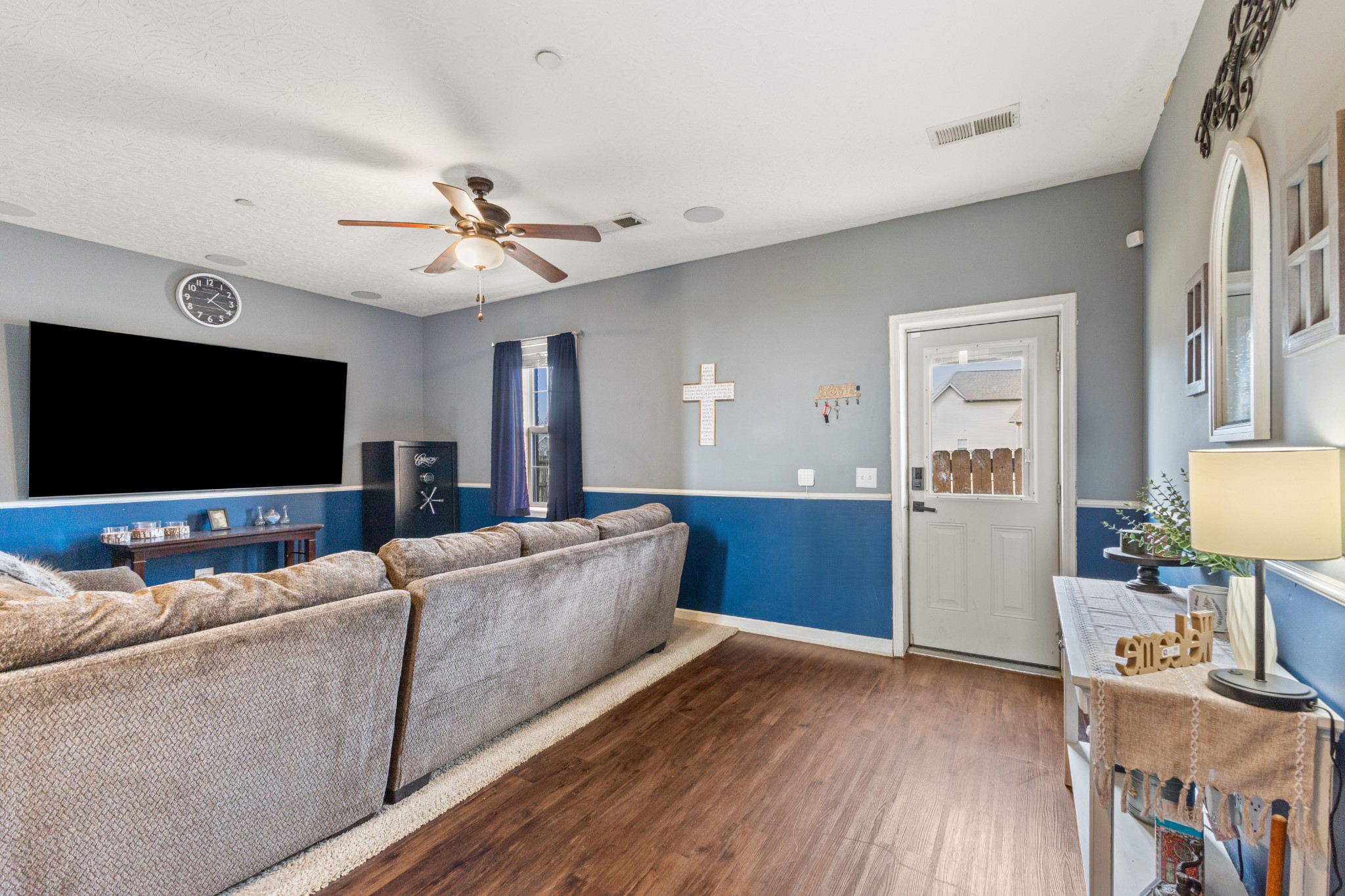 205 Emerald Circle Pleasant View, TN 37146 - Photo 20 of 22 a living room with furniture and a flat screen tv