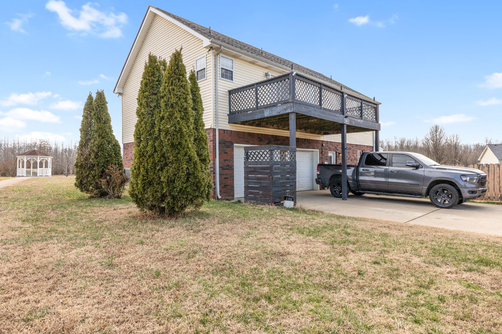 205 Emerald Circle Pleasant View, TN 37146 - Photo 21 of 22 a view of a car park in front of house